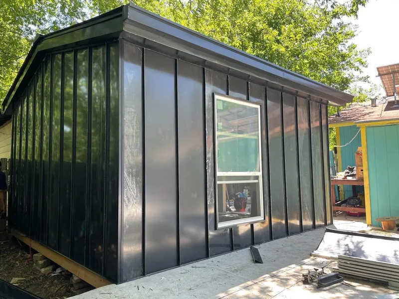 Black standing seam metal wall panels for Metal Roof Installation in Blakely